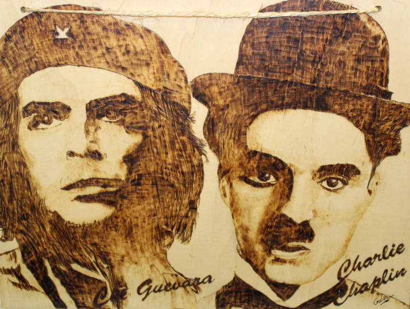Cuadro pirograbado del Che Guevara y Charlot