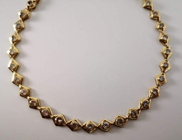 Pulsera rombos y circonitas en Oro 18 k