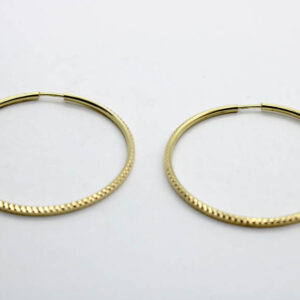 Argollas. Aros labradas en Oro 18 k