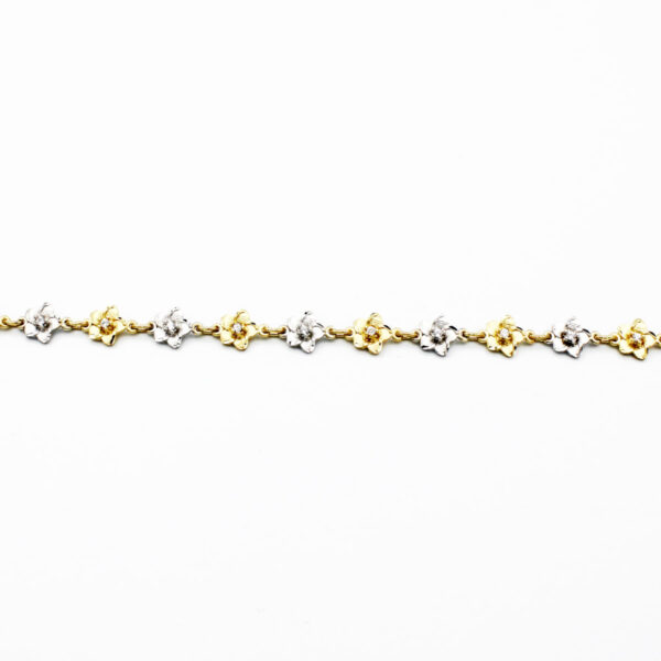 Pulsera de Flor bicolor en Oro 18k y Piedras Circonitas