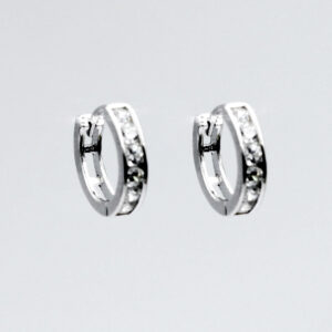 Aros de Clip mitad de Circonitas. Mitad Calado en Plata ley